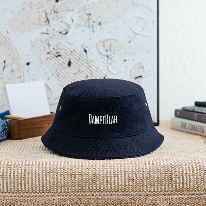 Trendy Kinder-Bucket-Hut mit dekorativen Nähten, Metall-Ösen und Satin-Schweißband in navy.