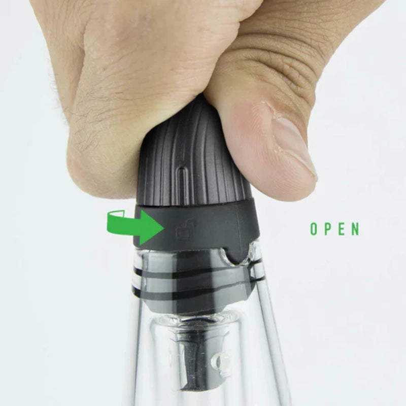 Puffco Peak Pro Travel Glass being opened for easy access to the water chamber.
